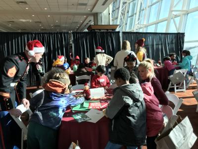 crafts with Marines, cheerleaders and player