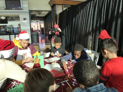 Participating in crafts with Marines, Redskins Players and Cheerleaders